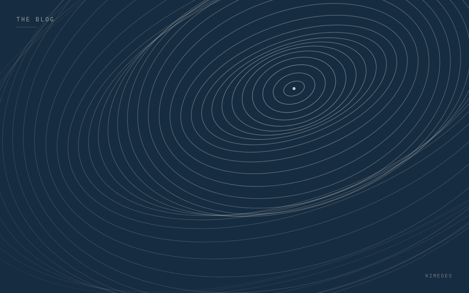 Concentric interferometric fringes on a navy ground.